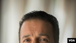 The image shows Libyan journalist Reda Fhelboom. (VOA/Taha Krewi)