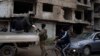 Syrian security forces search for pro-Assad militants in Homs, state media say