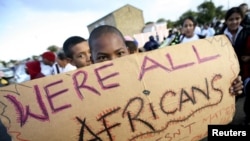 FILE - Migrants in Cape Town's Mannenberg community demonstrate against xenophobia. (UTERS/Mike Hutchings)