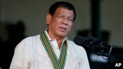 Philippine President Rodrigo Duterte addresses members of the army during the 120th anniversary celebration of the Philippine Army, April 4, 2017 at Fort Bonifacio, suburban Taguig city, east of Manila, Philippines. 