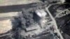 In this photo made from the footage taken from Russian Defense Ministry official web site on Oct. 4, 2015, an aerial view of a bomb explosion in Syria. 