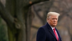 President Donald Trump walks on the South Lawn of the White House in Washington before boarding Marine One, Dec. 12, 2020.