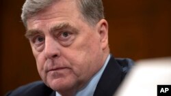 FILE - Retired Gen. Mark Milley, the former chairman of the Joint Chiefs of Staff, appears before the House Foreign Affairs Committee about the U.S. withdrawal from Afghanistan on Capitol Hill, March 19, 2024, in Washington.