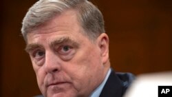 FILE - Retired Gen. Mark Milley, the former chairman of the Joint Chiefs of Staff, appears before the House Foreign Affairs Committee about the U.S. withdrawal from Afghanistan on Capitol Hill, March 19, 2024, in Washington.