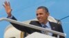 US President Barack Obama waves on his departure on Air Force One at Fiumicino Airport, March 28, 2014 in Rome.