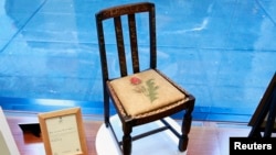 German designer Karl Lagerfeld appears with model Hudson Kroenig and other models at the end of his Haute Couture Fall/Winter 2018/2019 collection show for fashion house Chanel at the Grand Palais in Paris, France.