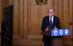 Director of the Oxford Vaccine Group, Andrew Pollard speaks during a virtual press conference inside 10 Downing Street in London on Nov. 23, 2020.