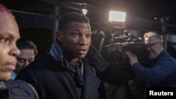Actor Jonathan Majors walks outside the court after the jury found him guilty in his assault and harassment case at Manhattan Criminal Court in New York City, Dec.18, 2023.