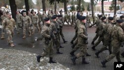 Polshaning Zagan shahrida Amerika qo'shinlarini tantanali kutib olish marosimi o'tmoqda. 12-yanvar, 2017-yil.