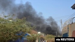 Smoke rises from fighting between Somali federal army and Jubaland state forces in Beled Hawo, in the Gedo region of Somalia, Jan. 25, 2021, in this image obtained via social media. (SHAFIE A. MAGAN @ShafiMagan)
