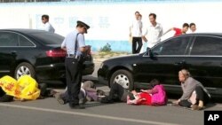 Aggrieved Chinese Face Swift Police Repression