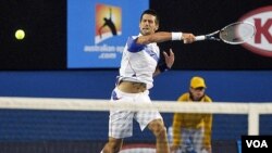 Novak Djokovic bermain kurang meyakinkan dan kalah mudah 3-6, 1-6 dari petenis Spanyol David Ferrer dalam Final ATP World Tour di London (23/11).