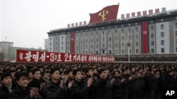 Members of the House of Representatives begin to head for the door on Capitol Hill in Washington as Congress leaves for a five-week summer recess.