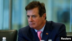 FILE - Paul Manafort attends a roundtable discussion on security at Trump Tower in New York, Aug. 17, 2016.