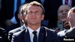 រូបឯកសារ៖ ប្រធានាធិបតីបារាំងលោក Emmanuel Macron ចូលរួមក្នុងពិព័រណ៍អាកាស​អន្តរជាតិលើកទី ៥៣ នៅ​ព្រលានយន្តហោះ Le Bourget ជិតក្រុងប៉ារីស។ 