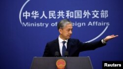 រូបឯកសារ៖ អ្នកនាំពាក្យក្រសួងការបរទេសចិនលោក Wang Wenbin ថ្លែងទៅកាន់អ្នកសារព័ត៌មាននៅក្នុងសន្និសីទសារព័ត៌មាមួយ នៅទីក្រុងប៉េកាំង ប្រទេសចិន កាលពីថ្ងៃទី ១៤ ខែធ្នូ ឆ្នាំ ២០២០។