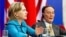 US Secretary of State Hillary Clinton speaks alongside Chinese Vice-Premier Wang Qishan (R) during a signing ceremony in Beijing, 25 May 2010