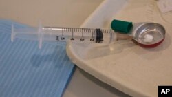 FILE - Injection materials are pictured.