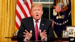 Presiden Amerika Donald Trump saat berpidato 'prime-time' di Gedung Putih, Washington, D.C., 8 Januari 2019.