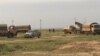 Vehicle-based rocket launching system positioned just behind combined Iraqi and Kurdish Peshmerga frontline at Makhmour, March 24, 2016. (S. Behn / VOA) 