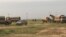 Vehicle-based rocket launching system positioned just behind combined Iraqi and Kurdish Peshmerga frontline at Makhmour, March 24, 2016. (S. Behn / VOA) 