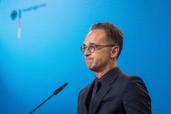 German Foreign Minister Heiko Maas attends a press conference at the Foreign Ministry in Berlin.