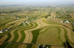 FILE - Farms dot the landscape in this aerial view in Pennsylvania's Lancaster County.