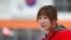 Former North Korean ice hockey player Hwangbo Young coaches an ice hockey class for children at an ice rink in Seoul, South Korea, April, 4, 2017.