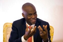 FILE - Haiti's President Jovenel Moise speaks during an interview in his office in Port-au-Prince, Haiti, Aug. 28, 2019.