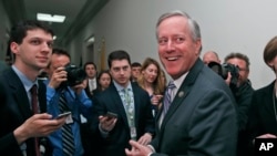 House Freedom Caucus Chairman Rep. Mark Meadows, R-N.C. smiles as he speaks with the media on Capitol Hill in Washington, March 23, 2017.