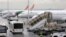FILE - Air Cote d'Ivoire planes are seen at Felix Houphouet Boigny International airport, in Abidjan, Cote d' Ivoire, June 26, 2020. 