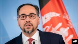 FILE - Then-Afghan Foreign Minister Salahuddin Rabbani talks to the media in Berlin, Germany, June 28, 2019.
