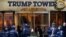 FILE - Members of the New York Police Department's counterterrorism unit guard Trump Tower, in New York City, Nov. 14, 2016. President Trump has alleged that his offices in the building were wiretapped last year on order of President Barack Obama.