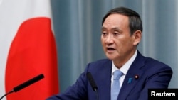 资料照：日本内阁官房长官菅义伟在记者会上讲话。（2019年9月11日）