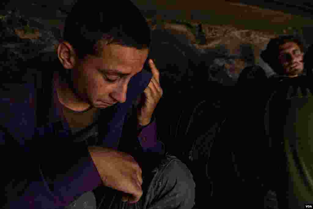 This Afghan boy&#39;s legs were torn up by barbed wire as he crossed the border from Iran into Turkey, but he is too afraid of arrest to seek medical help, in Van, Turkey, Sept. 1, 2021.