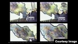 Snimke s videozapisa događaja Jedinice za specijalne operacije iz 1997., prikazanog tokom suđenja, u kojem su Jovica Stanišić i Slobodan Milošević ispred mape mjesta za trening kampove. (Foto: IRMCT)