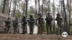 Ukrainian women juggle military service and civilian life