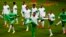 Preparing to play Germany, Algeria's Rafik Halliche, center, and teammates train at the Arena do Gremio in Porto Alegre, Brazil, June 29, 2014. 