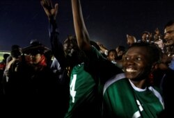Players from Sudan's of Al-tahadi women's soccer team react after taking part in Sudan's first women's league soccer match at the Khartoum stadium, Khartoum, Sudan, Sept. 30, 2019.