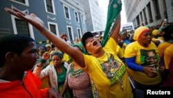 Pro-Zuma supporters cheer during the vote of no confidence against President Jacob Zuma in Cape Town, South Africa, Aug. 8, 2017. 
