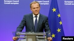 FILE - European Council President Donald Tusk briefs the media after Britain voted to leave the bloc, in Brussels, Belgium, June 24, 2016.