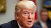  President Donald Trump speaks in the Roosevelt Room of the White House in Washington. 