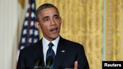 奥巴马总统5月15日在白宫東厅发表谈话，论及国税局代局长辞职问题