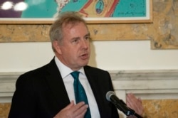 FILE - British Ambassador Kim Darroch hosts a National Economists Club event at the British Embassy in Washington, Oct. 20, 2017.
