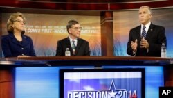 AQSh Senatiga Shimoliy Karolinadan nomzodlar: amaldagi senator, demokrat Key Xeygen (chapda), Liberal partiyadan Shon Xaf (o'rtada) va respublikachilardan Tom Tillis Vilmington shahridagi debat paytida, Shimoliy Karolina, 9-oktabr, 2014-yil