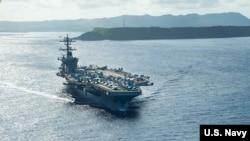Kapal induk USS Theodore Roosevelt (CVN 71) di Laut Filipina 21 Mei 2020. (Foto: Courtesy/US Navy)