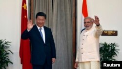 印度总理莫迪在新德里会晤中国国家主席习近平。（2014年9月18日）