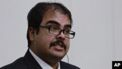 Arturo Pierre Martinez of El Paso, Texas, speaks during a press conference in Pyongyang, North Korea, Dec. 14, 2014.