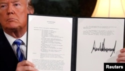 U.S. President Donald Trump holds a proclamation declaring his intention to withdraw from the JCPOA Iran nuclear agreement at the White House in Washington, May 8, 2018. Analysts say leaving the Iran nuclear deal is unlikely to derail momentum to reach a deal with North Korea. 