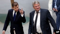 Christian Lüth, spokesman of the Alternative for Germany (AfD) party, left, and Joerg Meuthen, co-chairman of the Alternative for Germany (AfD) party, right, arrive for a press conference in Berlin, Germany, Sept. 2, 2019.